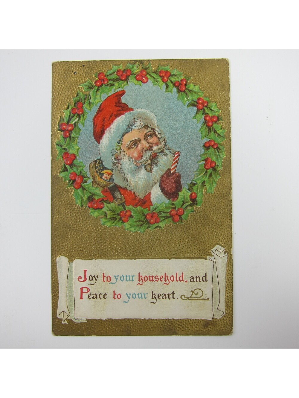 Vintage Christmas Postcard Santa Pipe Candy Cane Toy Sack Holly Embossed Antique